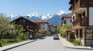 : Ivan Mihaylov Street in the center of Bansko with a view of Pirin Mountain