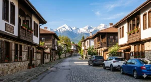 Cozy residential street Ohrid in the Bonare district, Bansko with traditional houses and views of Pirin Mountain