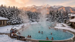 Външен минерален басейн около Банско през зимата със заснежени планини