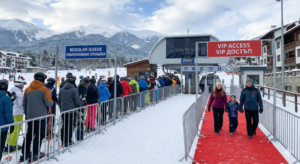 A queue in front of the gondola lift in Bansko and an empty VIP corridor