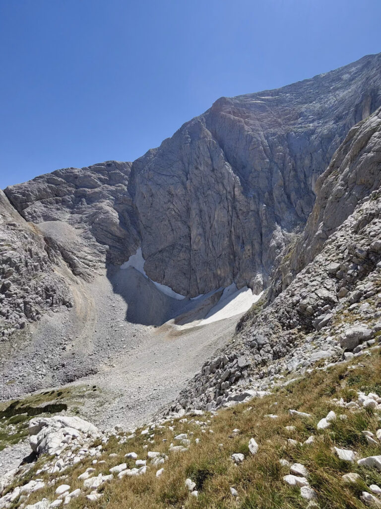 The Kazanite Circus in Pirin with marble rocks and year-round snow under Vihren Peak.