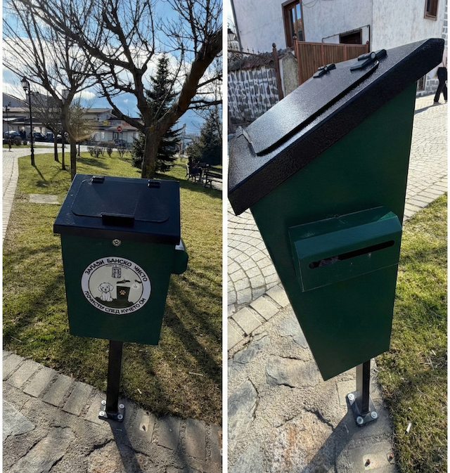 Green specialized dog litter box in Bansko with a "Keep Bansko Clean" sticker and a dispenser for free bags.